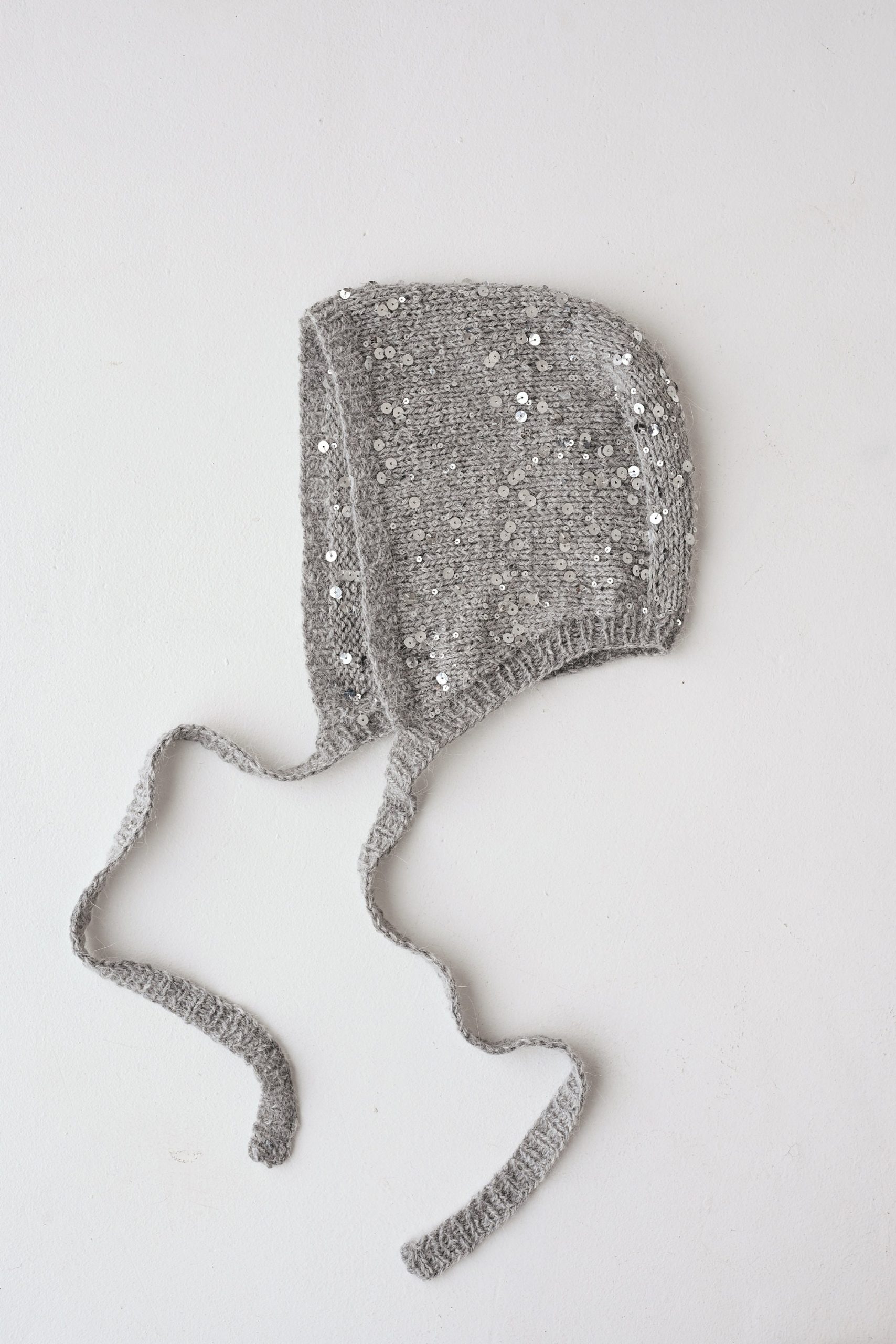 Hand Knitted Wool Bonnet: Sequined Ear Flap Hat