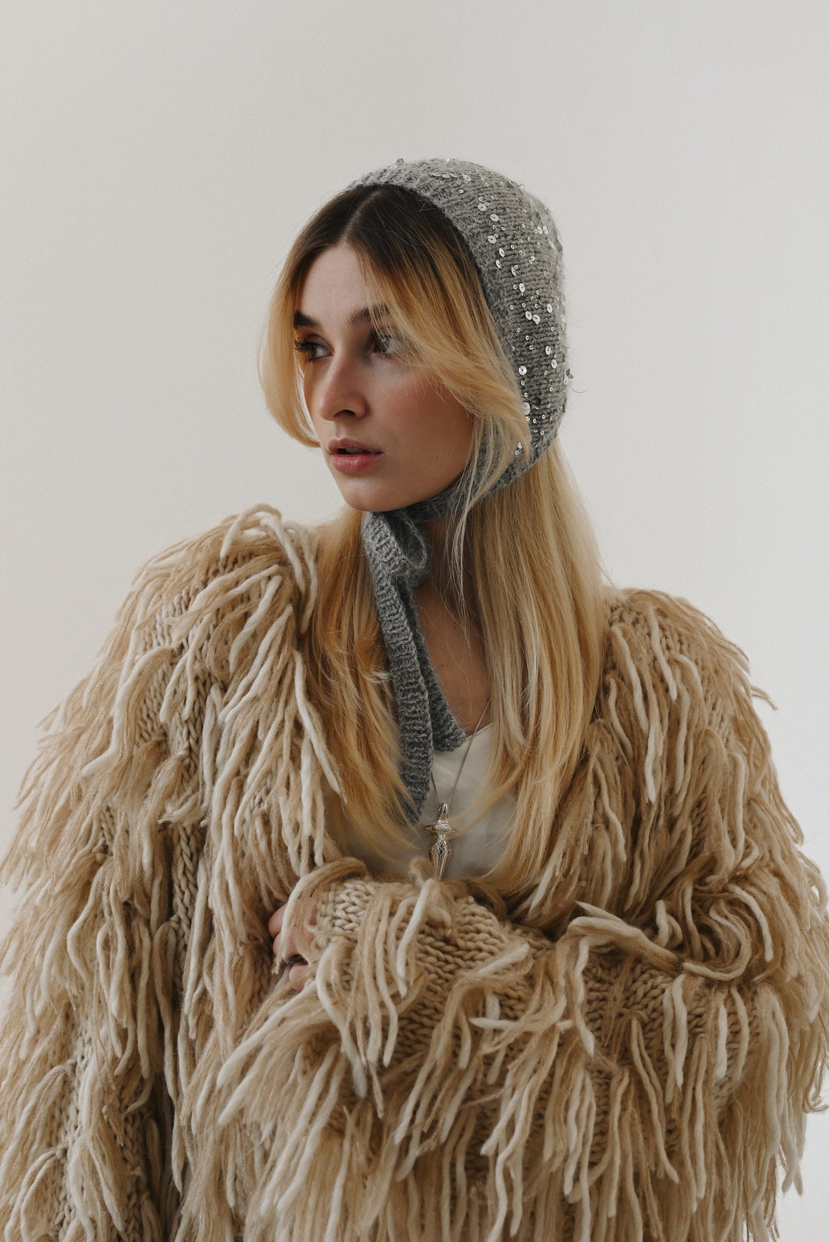 Hand Knitted Wool Bonnet: Sequined Ear Flap Hat